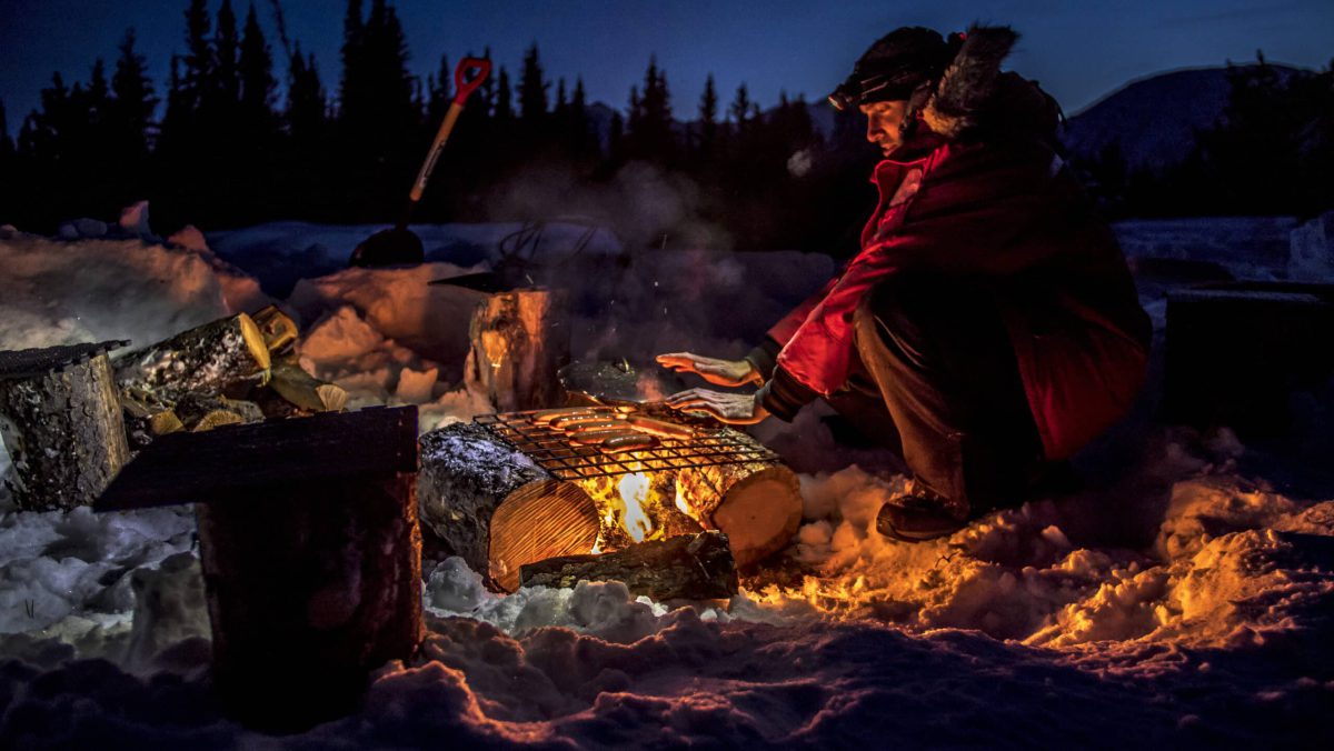 yukon-campfire-cooking-winter-night